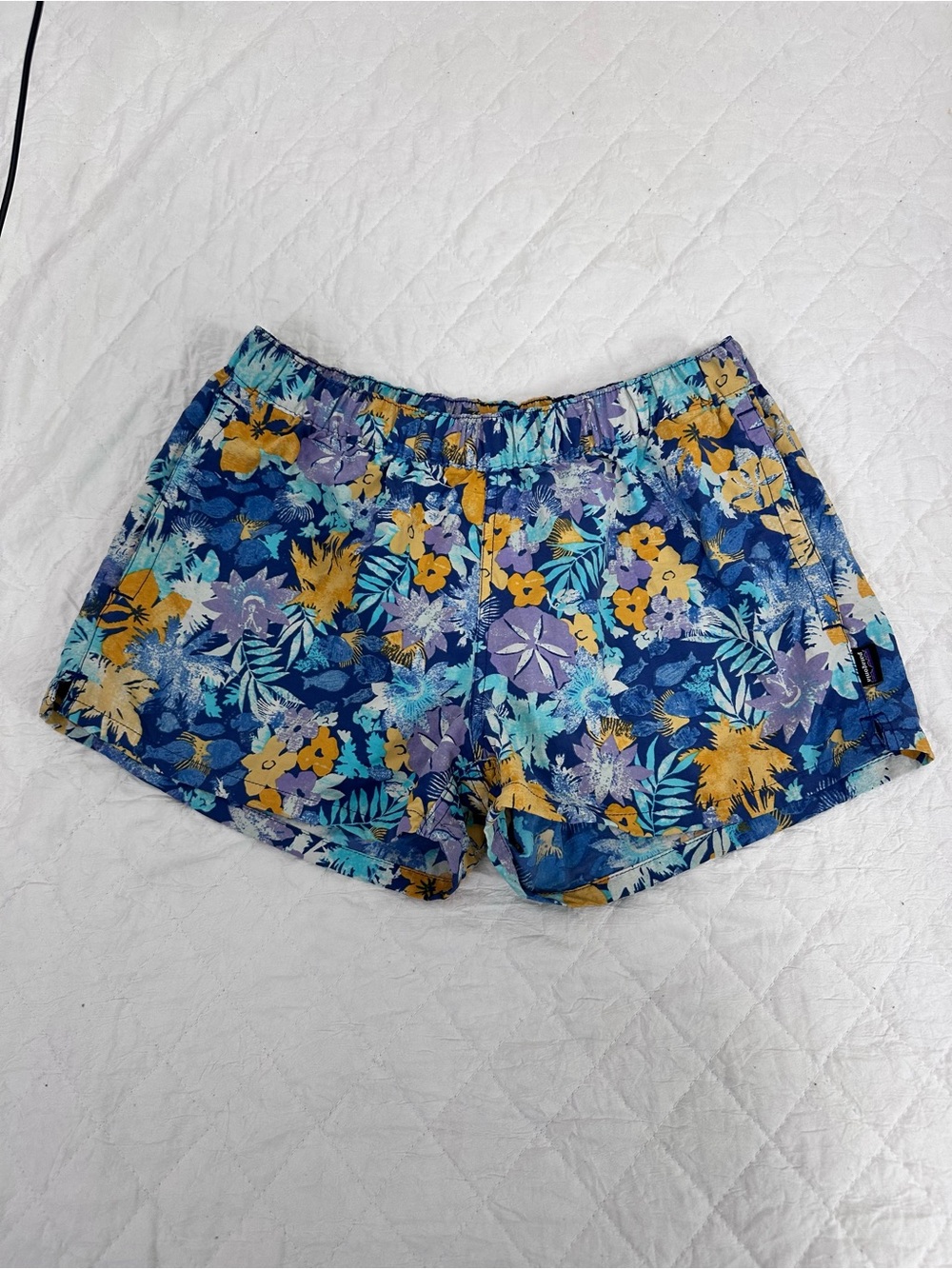 Patagonia Floral Athletic Shorts in Blue with Yellow & Purple Accents